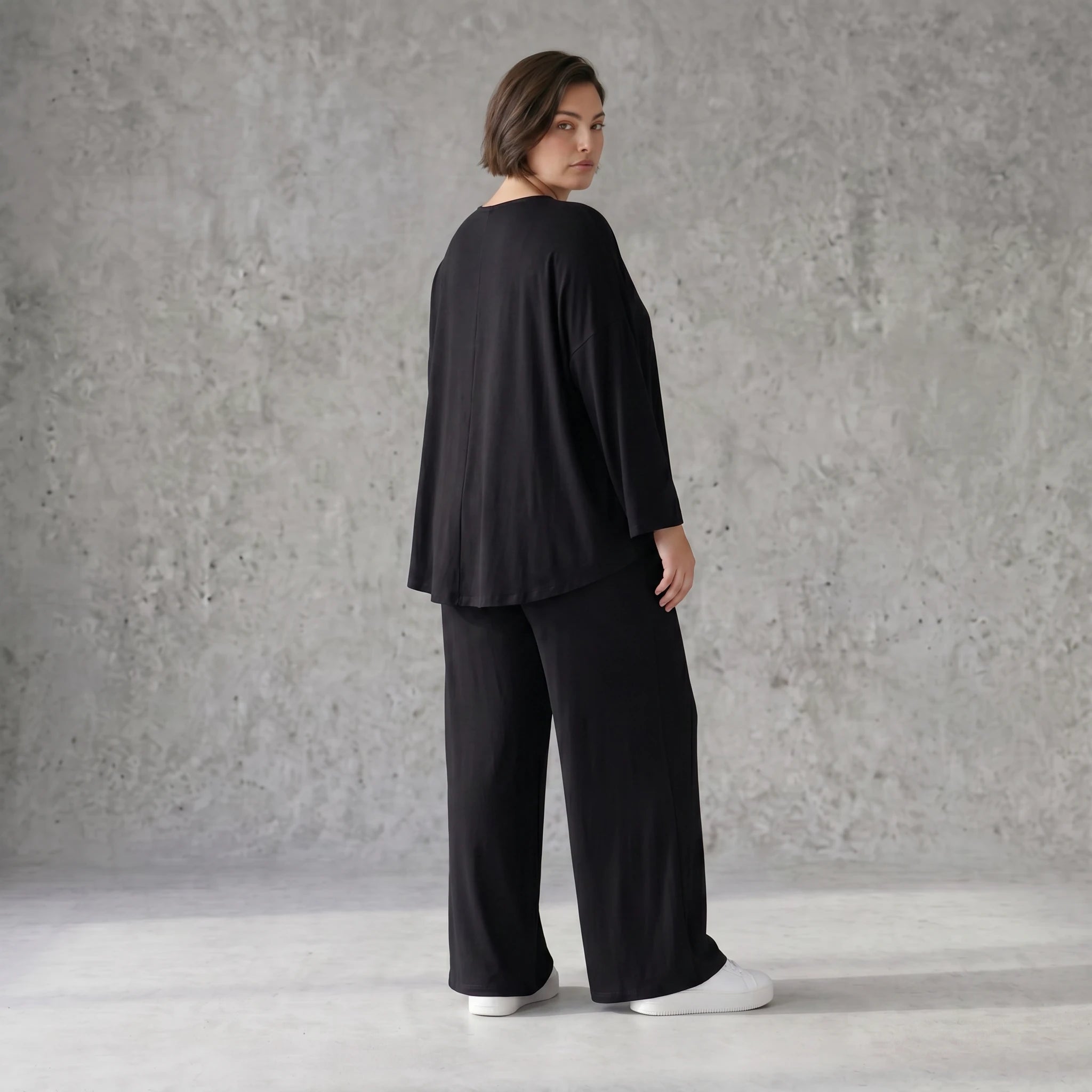 Schwarze Viskosehose mit Stretch und weitem geradem Schnitt Elastikbund Seitentaschen