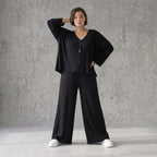 Schwarze Viskosehose mit Stretch und weitem geradem Schnitt Elastikbund Seitentaschen
