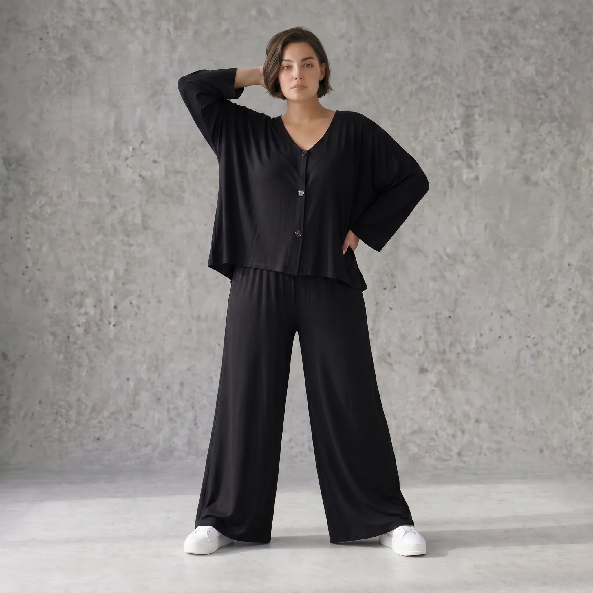 Schwarze Viskosehose mit Stretch und weitem geradem Schnitt Elastikbund Seitentaschen