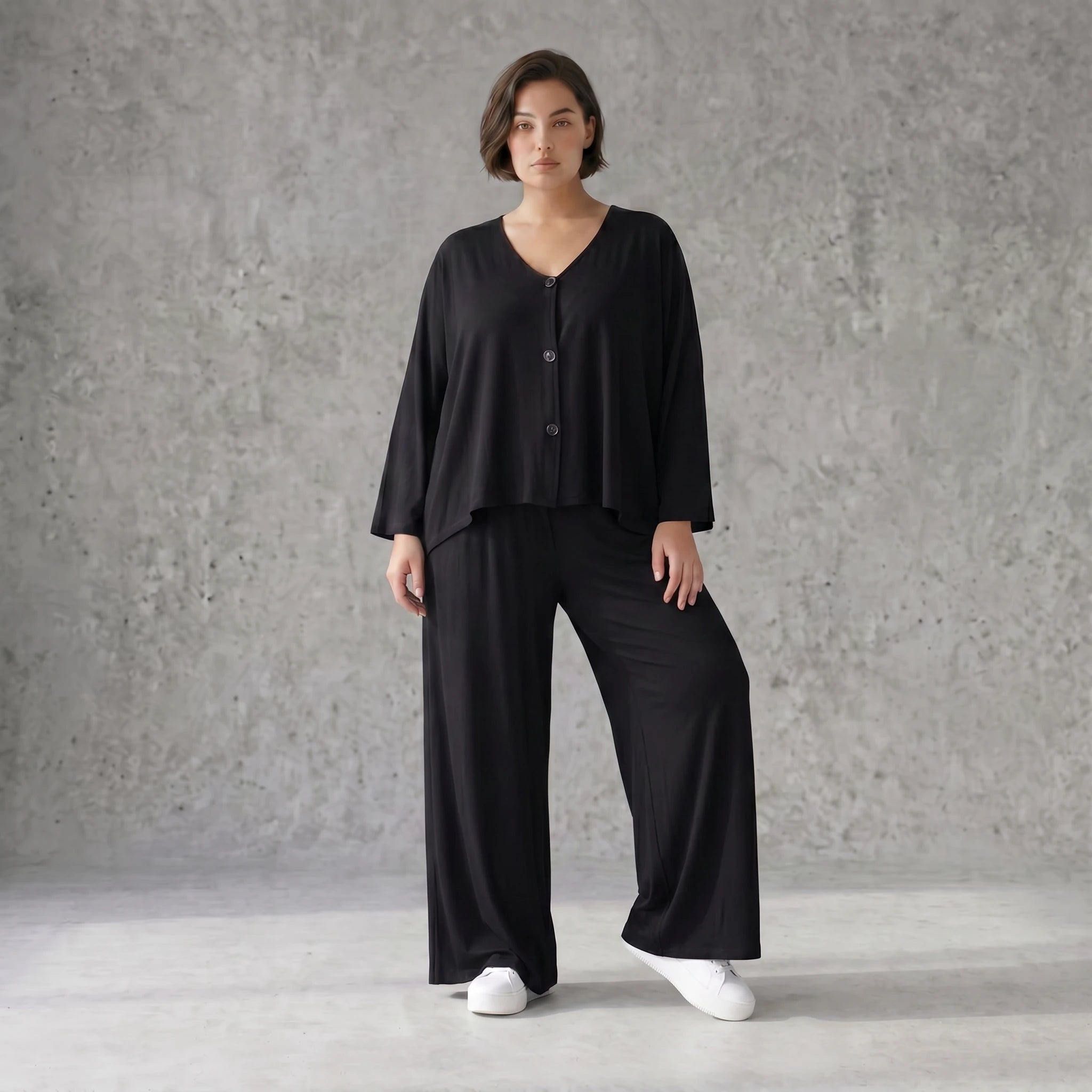 Schwarze Viskosehose mit Stretch und weitem geradem Schnitt Elastikbund Seitentaschen