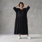 Schwarzes Ballonkleid aus Jersey mit Stretch Rundhalsausschnitt und Seitennahttaschen