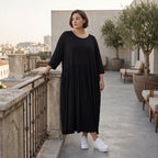 Schwarzes Ballonkleid aus Jersey mit Stretch Rundhalsausschnitt und Seitennahttaschen