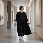 Schwarzes Ballonkleid aus Jersey mit Stretch Rundhalsausschnitt und Seitennahttaschen