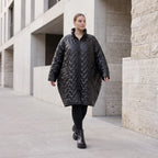 Schwarze Steppjacke mit grafischem Muster oversized wasserabweisend warm mit Taschen