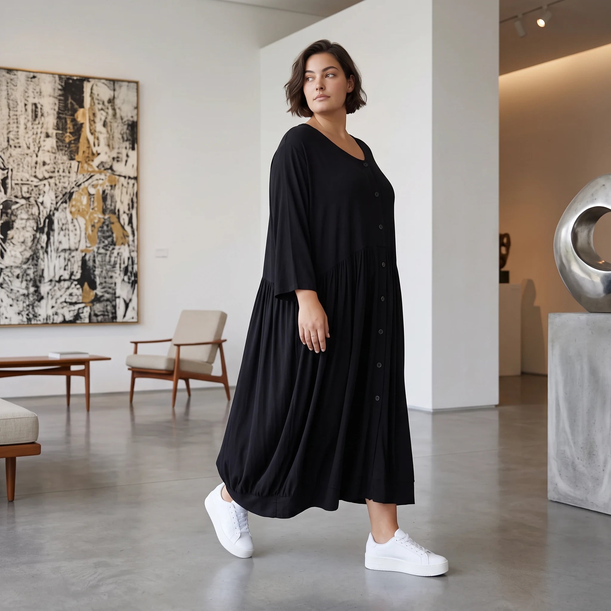 Schwarze Ballonbluse aus Jersey Oversizeschnitt Langarm Rundhals und gerafftem Saum