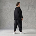 Schwarze Jerseyhose aus weichem Stretch mit Flügeltaschen und verjüngtem Bein ganzjährig