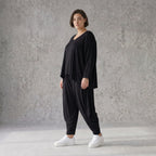Schwarze Jerseyhose aus weichem Stretch mit Flügeltaschen und verjüngtem Bein ganzjährig