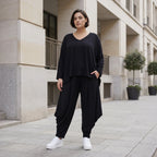 Schwarze Jerseyhose aus weichem Stretch mit Flügeltaschen und verjüngtem Bein ganzjährig