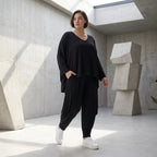 Schwarze Jerseyhose aus weichem Stretch mit Flügeltaschen und verjüngtem Bein ganzjährig