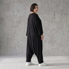 Schwarze Haremhose aus weicher Viskose mit tiefem Schritt und lässigem Komfortschnitt