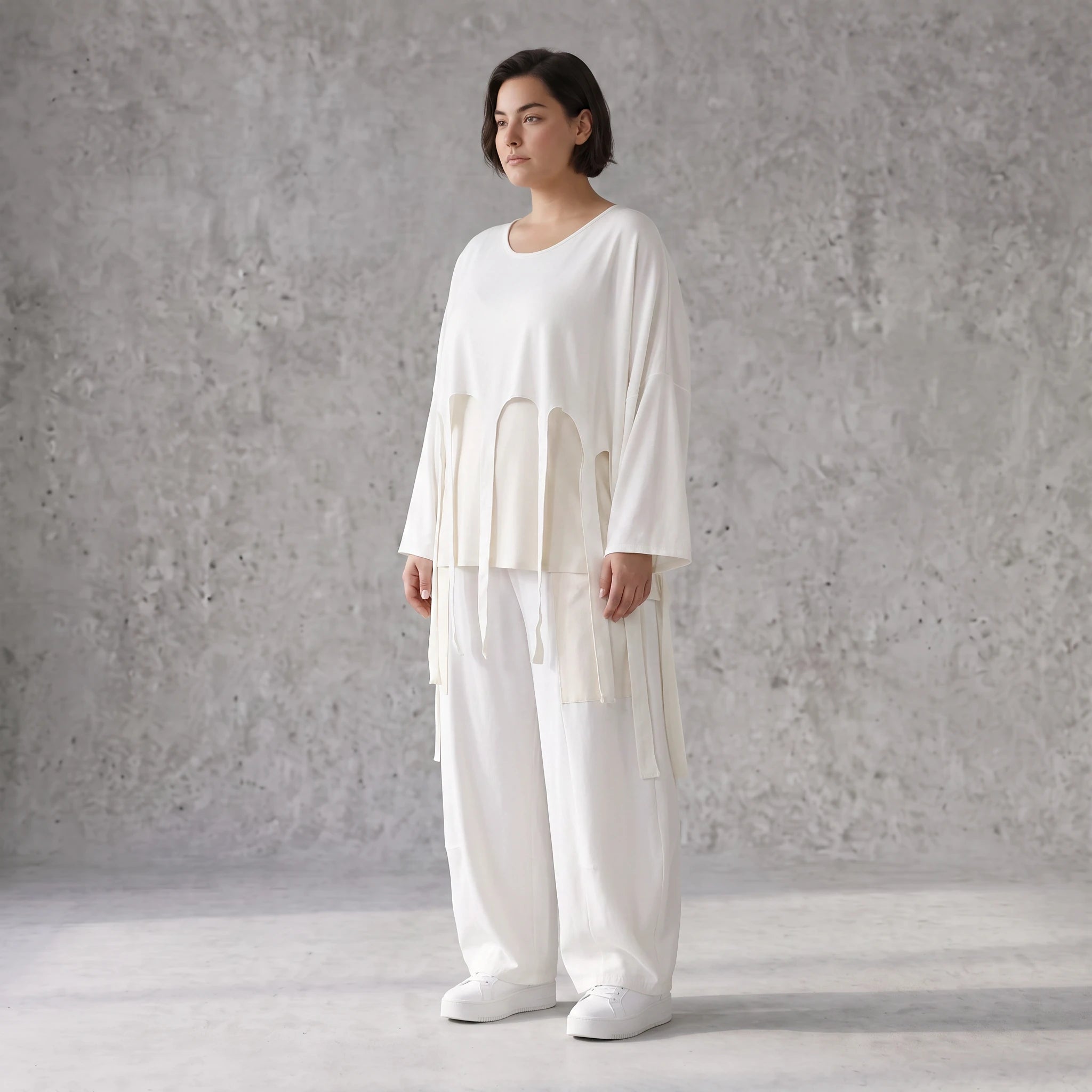 Zeitloser Oversize Lagenlook Überwurf in Creme leger luftig mit Fransen Detail fein soft