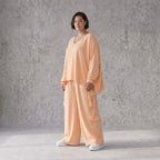 Legere Oversize Ballonhose in fliessendem Mauve mit Lagenlook und Fransen Details Trend