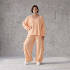 Legere Oversize Ballonhose in fliessendem Mauve mit Lagenlook und Fransen Details Trend