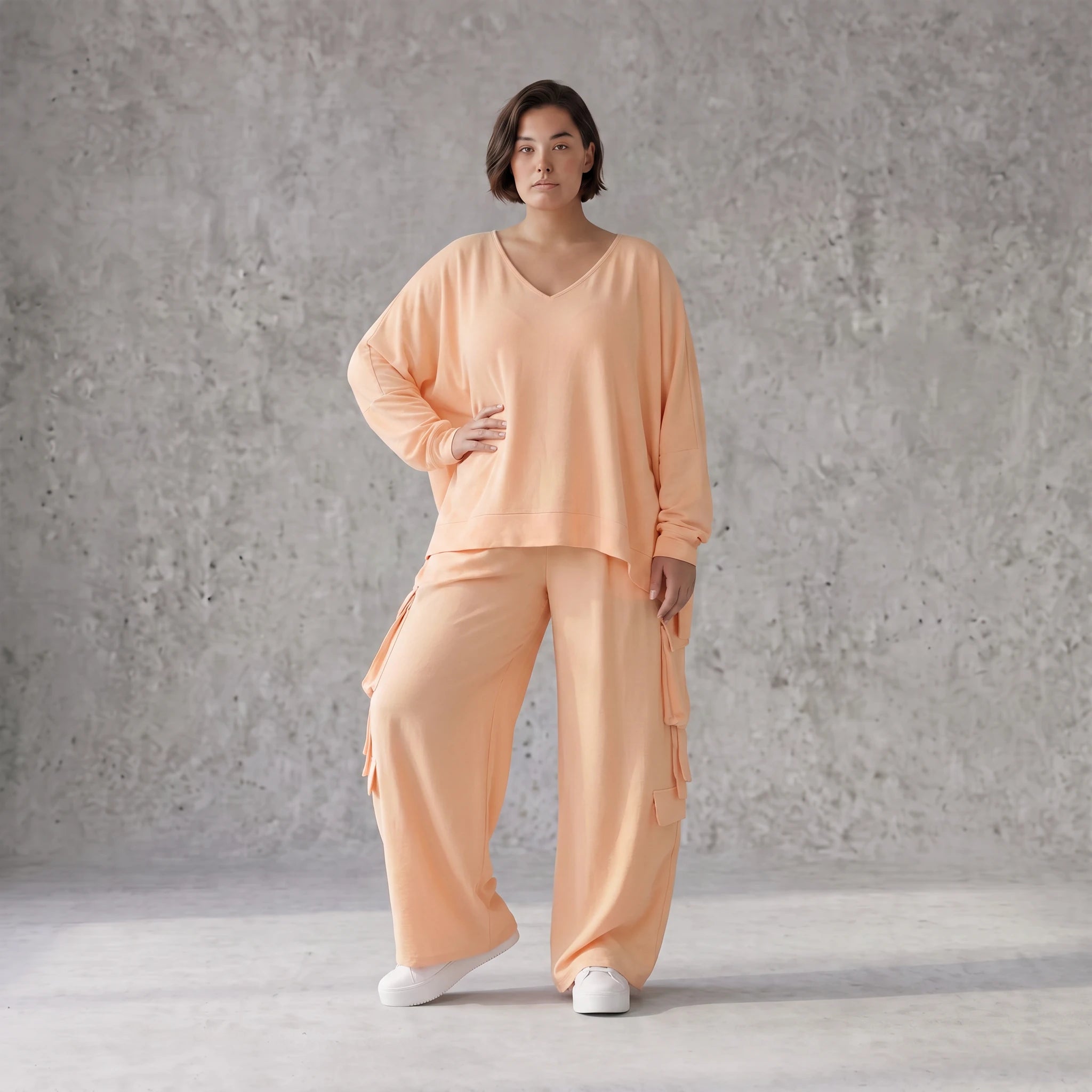 Legere Oversize Ballonhose in fliessendem Mauve mit Lagenlook und Fransen Details Trend