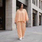 Legere Oversize Ballonhose in fliessendem Mauve mit Lagenlook und Fransen Details Trend