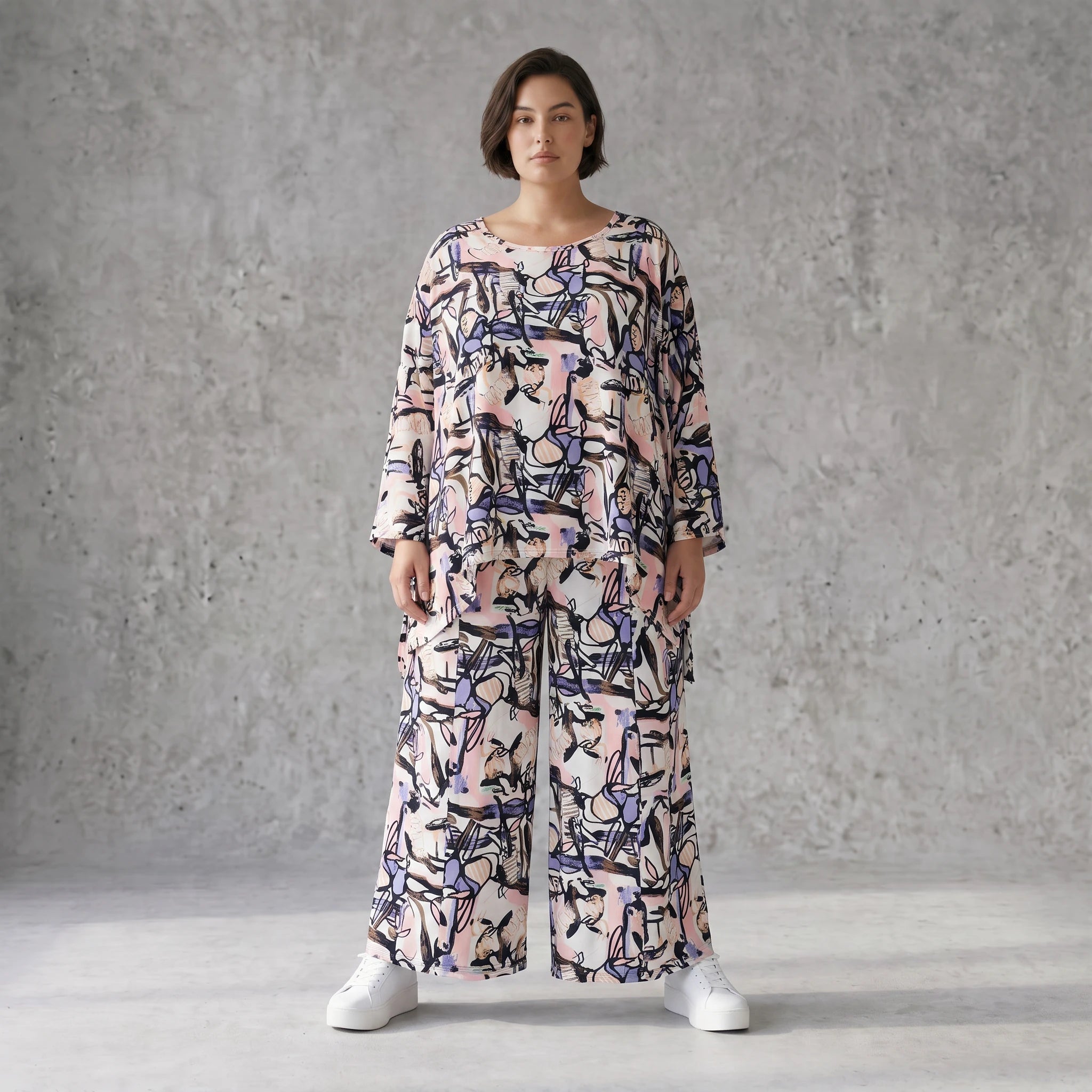 Oversized Shirt aus leichter Viskose Popeline in zartem Rosa mit asymmetrischem Schnitt