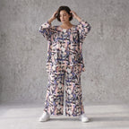 Oversized Shirt aus leichter Viskose Popeline in zartem Rosa mit asymmetrischem Schnitt