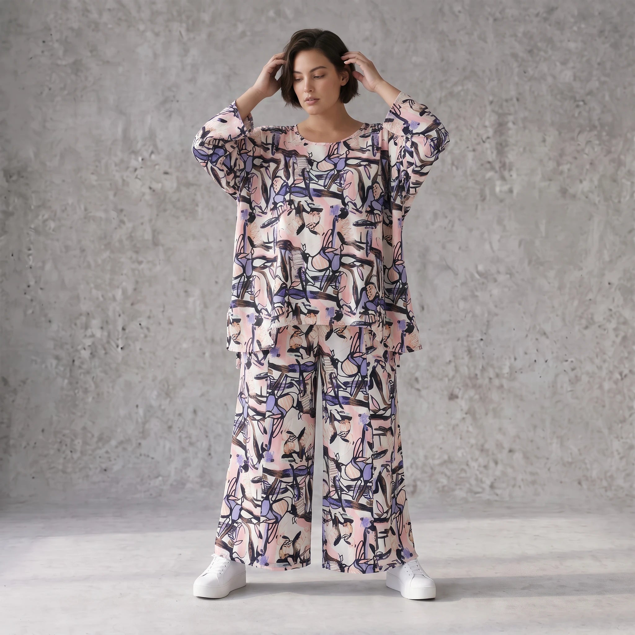 Oversized Shirt aus leichter Viskose Popeline in zartem Rosa mit asymmetrischem Schnitt
