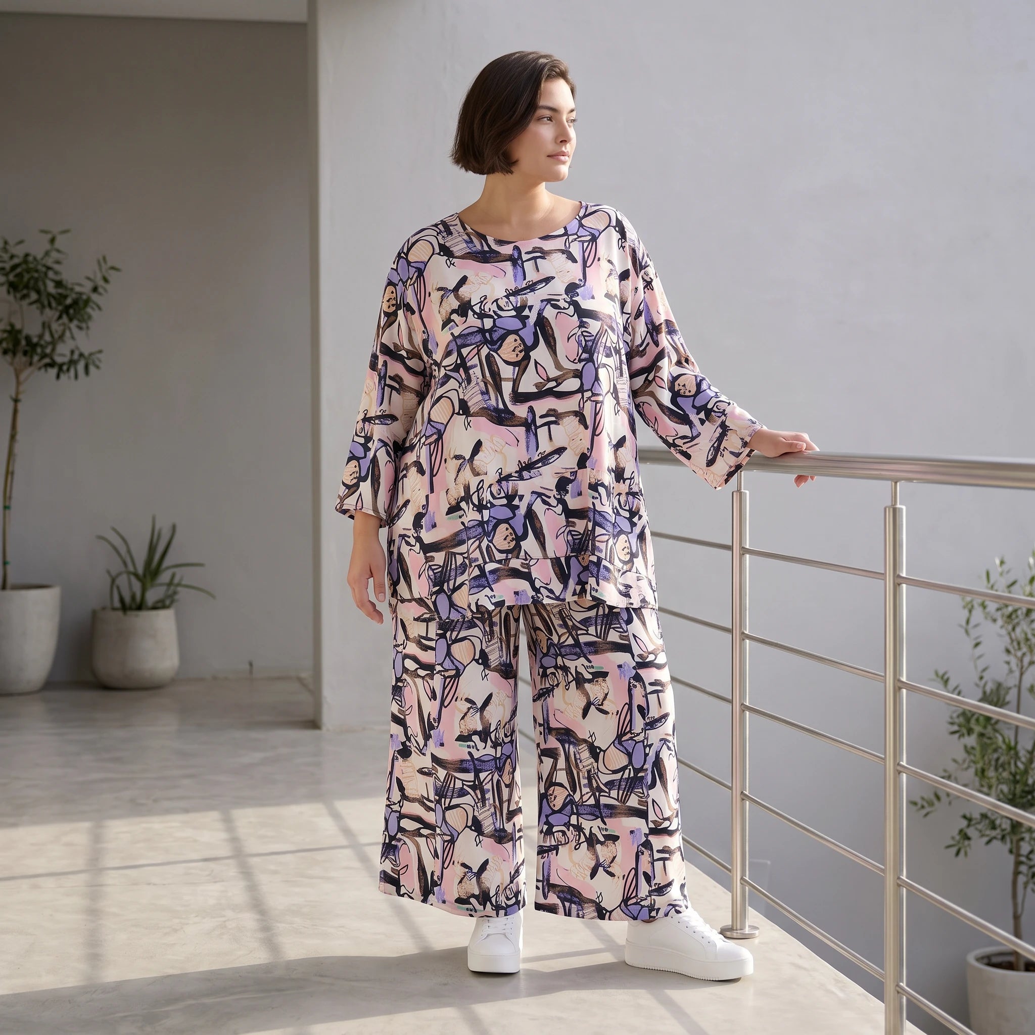 Elegante fließende Palazzo Hose aus reiner Viskose in zartem Rosa mit Bund und Taschen