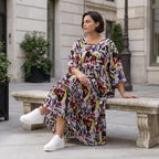 Fließendes Sommerkleid in Schwarz aus zartem Viskose Popeline mit gerüschtem Stufenvolant