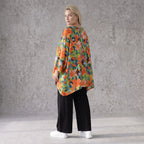 Luftiges Oversized Shirt in frischem Apfelgrün mit Vokuhila Schnitt aus Viskose Leinen