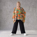 Luftiges Oversized Shirt in frischem Apfelgrün mit Vokuhila Schnitt aus Viskose Leinen