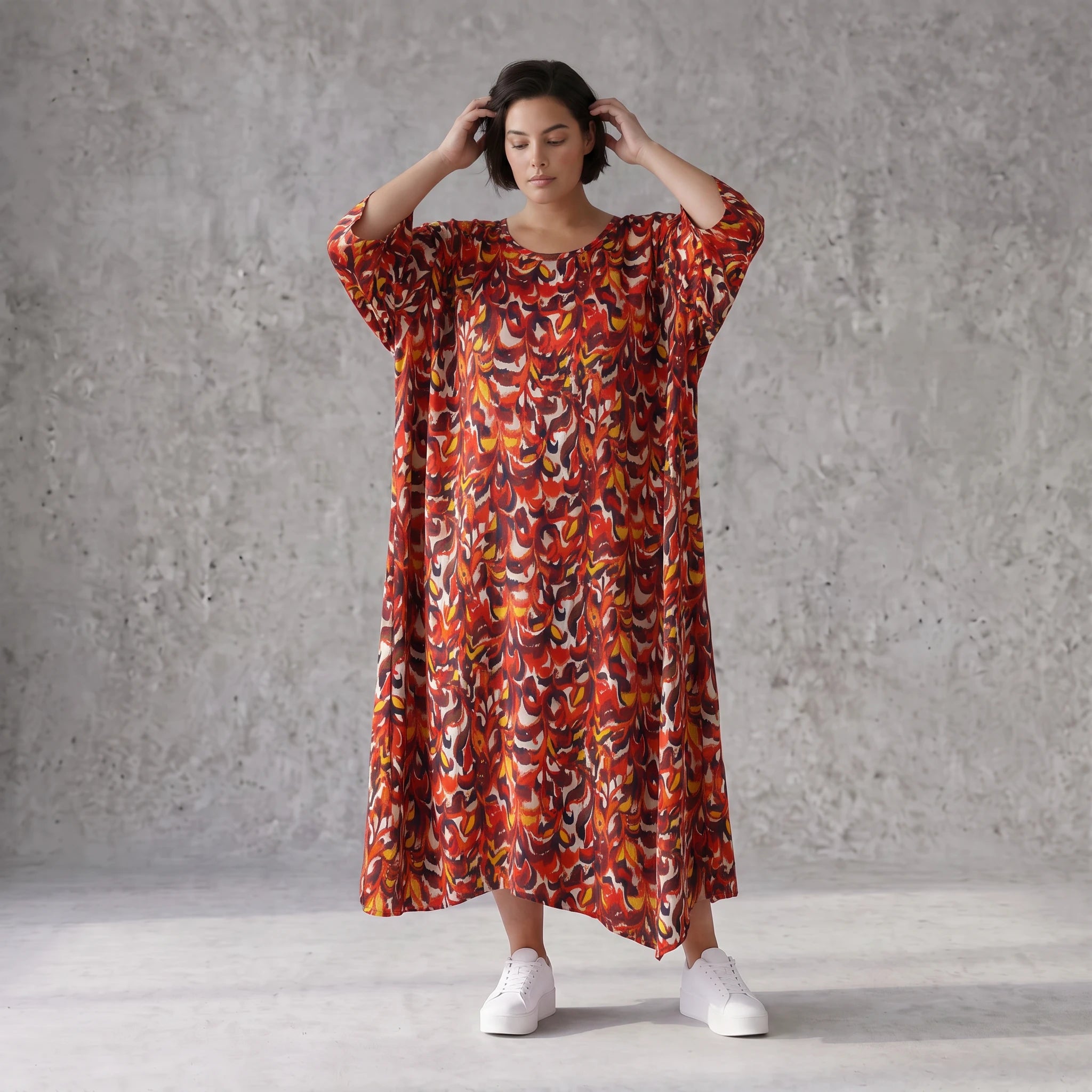 Ballonkleid in Rot und Schwarz aus weichem Popeline mit spitzem Saum und Dreiviertelarm