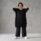 Elastisches Jersey Shirt in Schwarz mit 3/4-Arm Rundhalsausschnitt und weicher Saumraffung