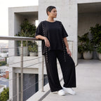 Lässiges Shirt in Schwarz mit kastiger Schnittform und Ösenbanddetail aus weichem Jersey