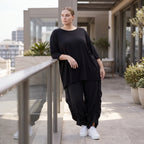 Damen Hose Avantgarde Lyocell Schwarz, Ballonschnitt, Flügeltaschen, Oversize große Größen – AKH Premium