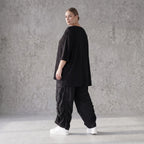 Damen Hose Avantgarde Lyocell Schwarz, Ballonschnitt, Flügeltaschen, Oversize große Größen – AKH Premium