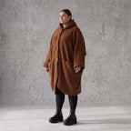 Teddymantel in Beige mit Kapuze Knopfverschluss Taschen und geradem Schnitt warm weich
