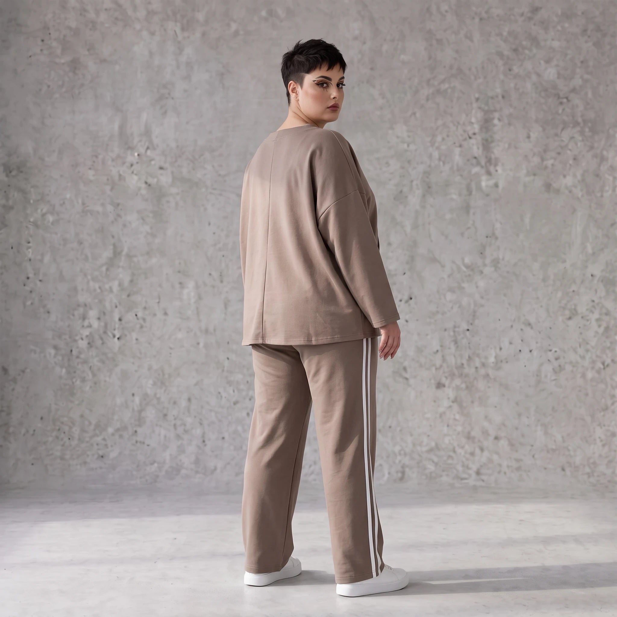 Sweatshirt aus French Terry mit Smileyprint und asymmetrischer Tasche in gerundeter Form