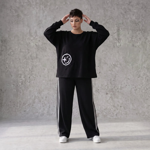 Sweatshirt mit Smileyprint und asymmetrischer Tasche aus weichem French Terry Rundhals