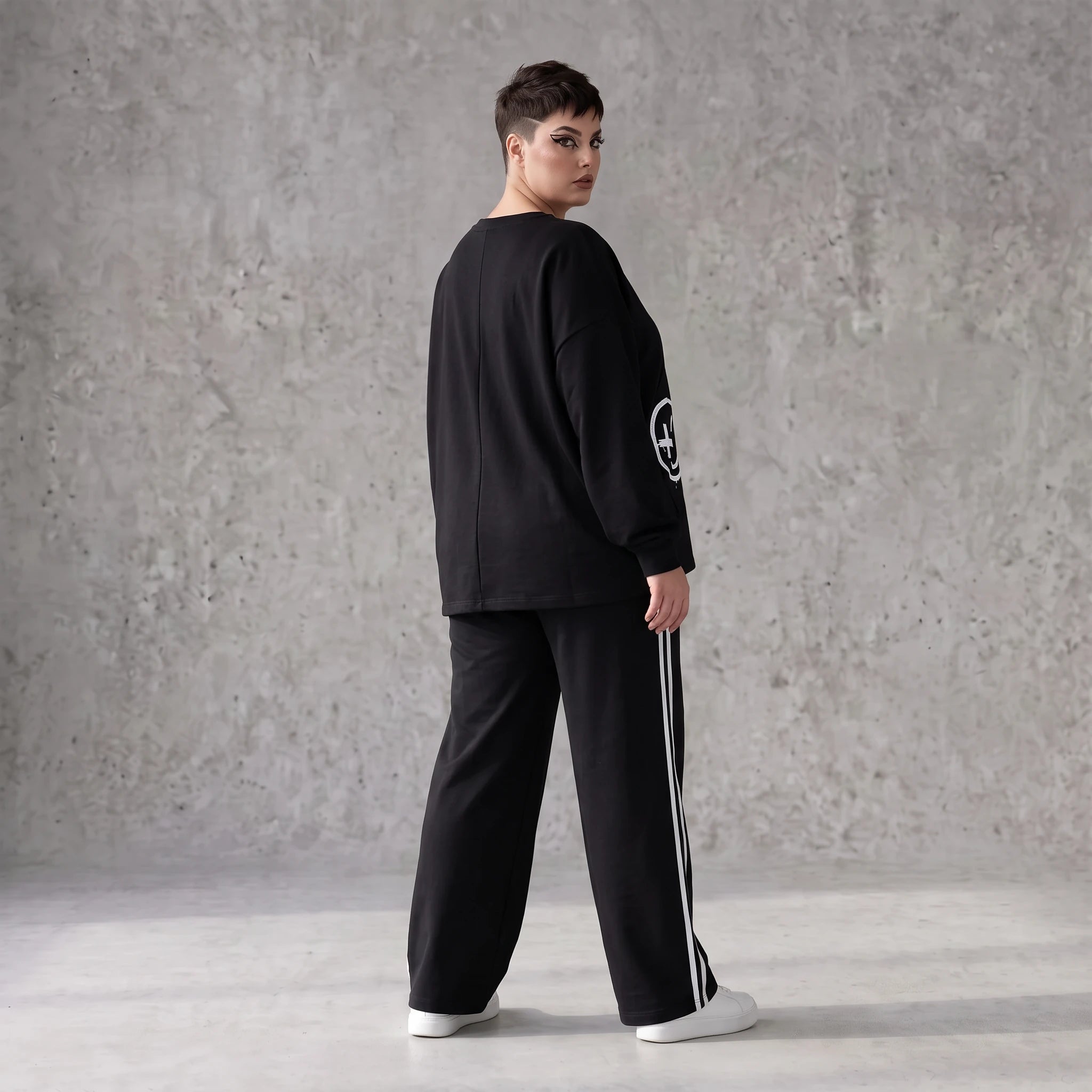 Sweatshirt mit Smileyprint und asymmetrischer Tasche aus weichem French Terry Rundhals