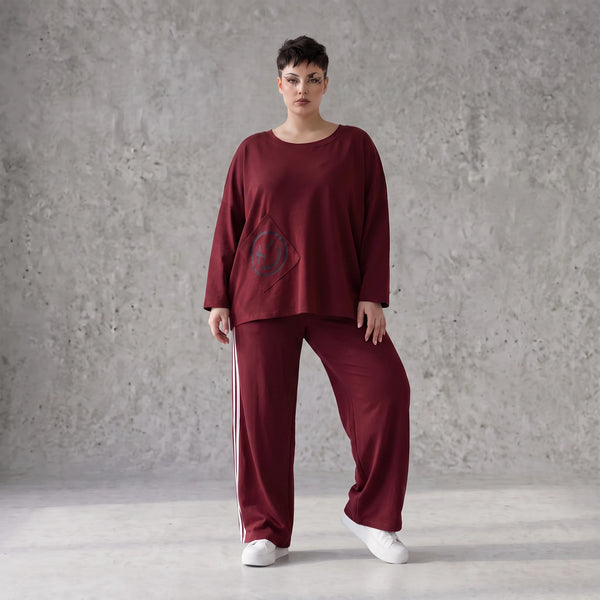 Rote Ballonhose aus French Terry mit Kontraststreifen und elastischem Bund Streetwear
