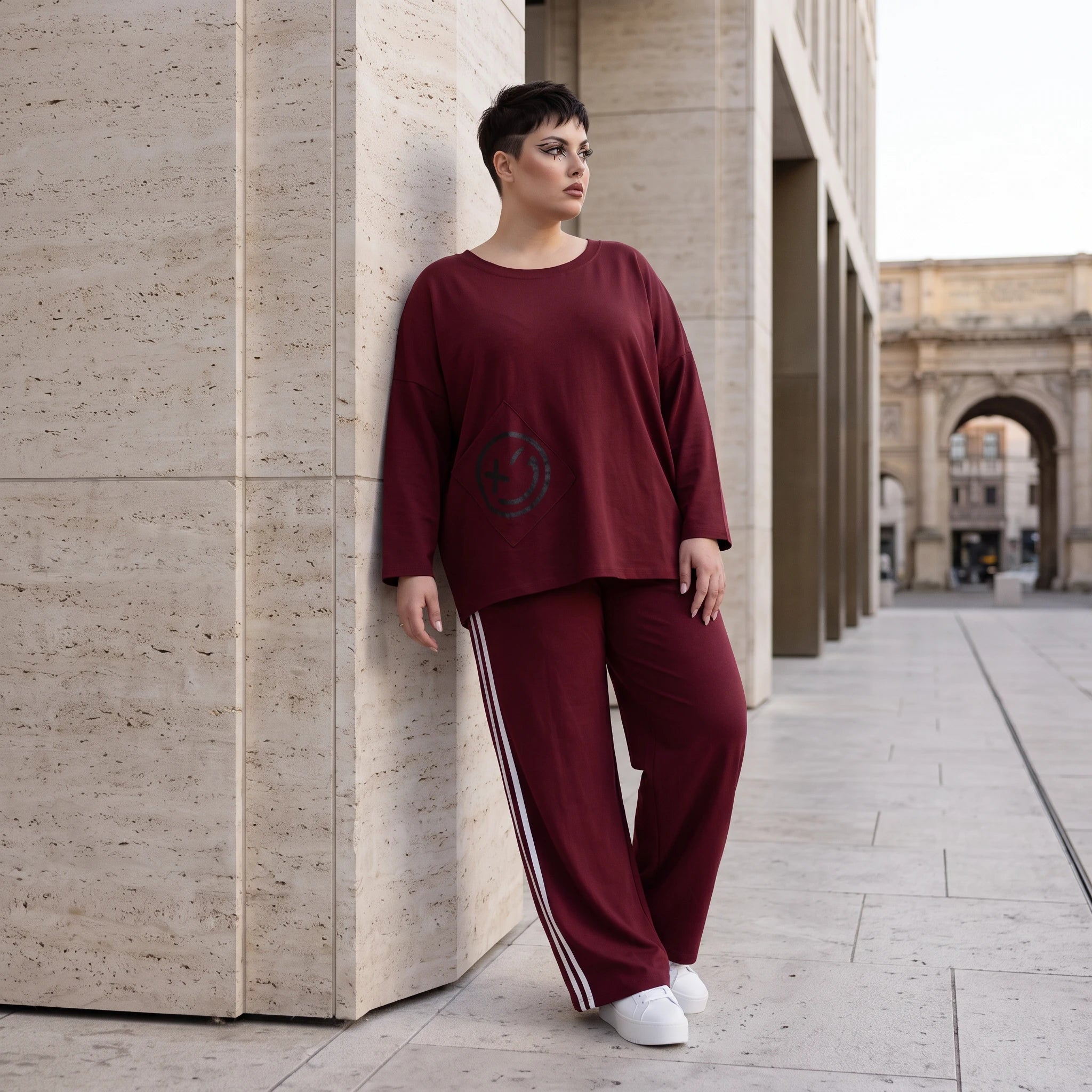 Rote Ballonhose aus French Terry mit Kontraststreifen und elastischem Bund Streetwear