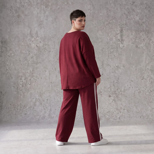 Rote Ballonhose aus French Terry mit Kontraststreifen und elastischem Bund Streetwear
