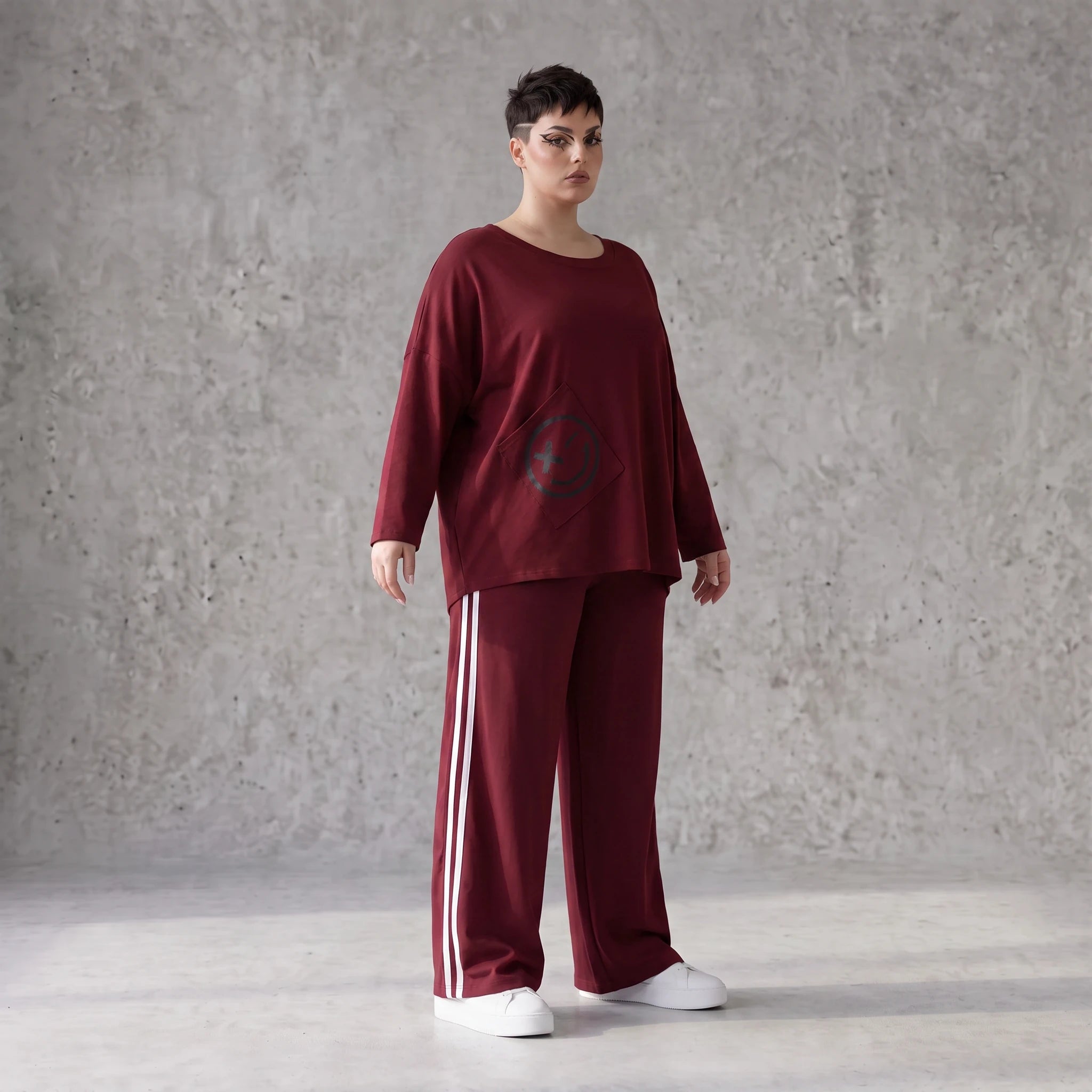 Rote Ballonhose aus French Terry mit Kontraststreifen und elastischem Bund Streetwear