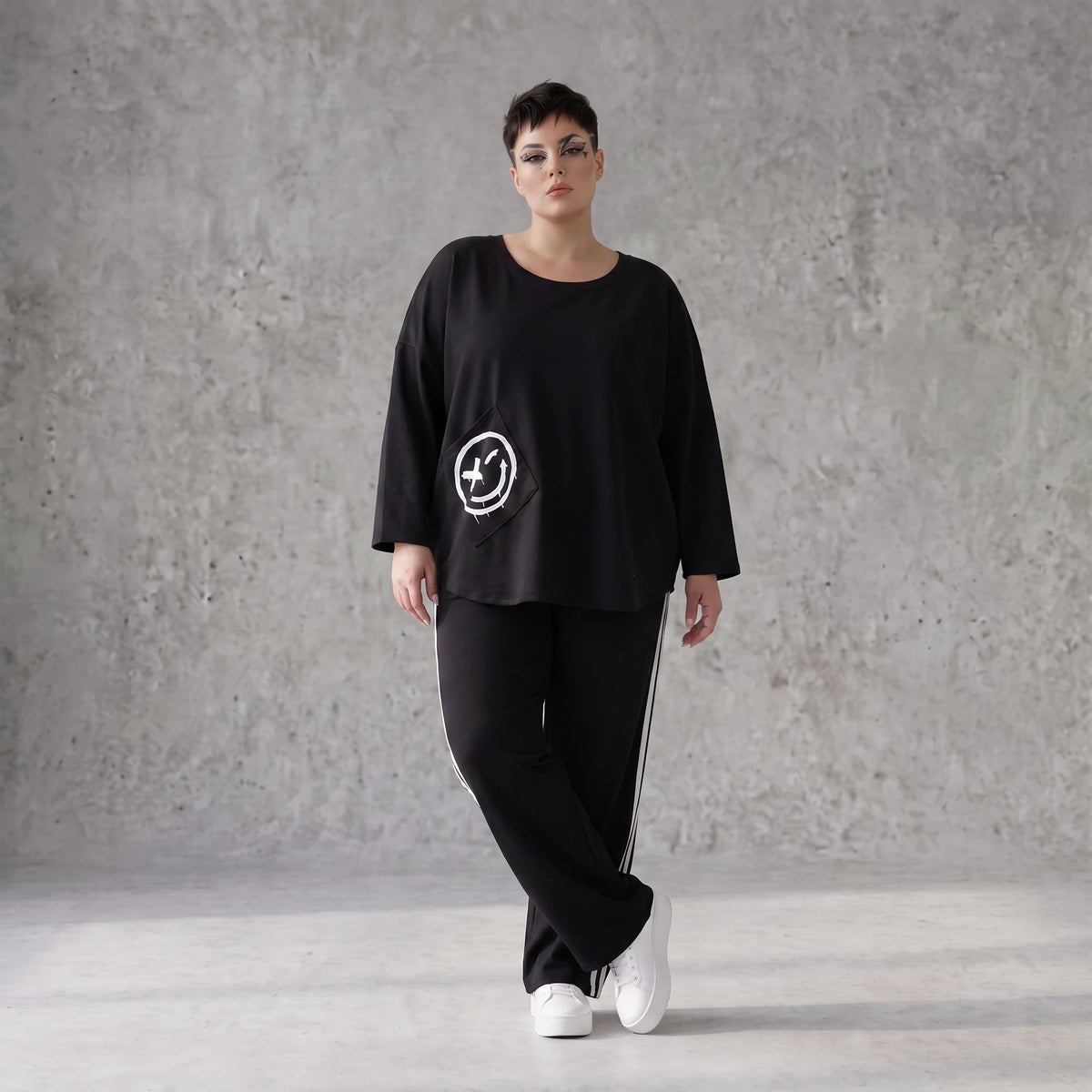 Ballonhose mit elastischem Bund und weissen Kontraststreifen im sportlichen College Look