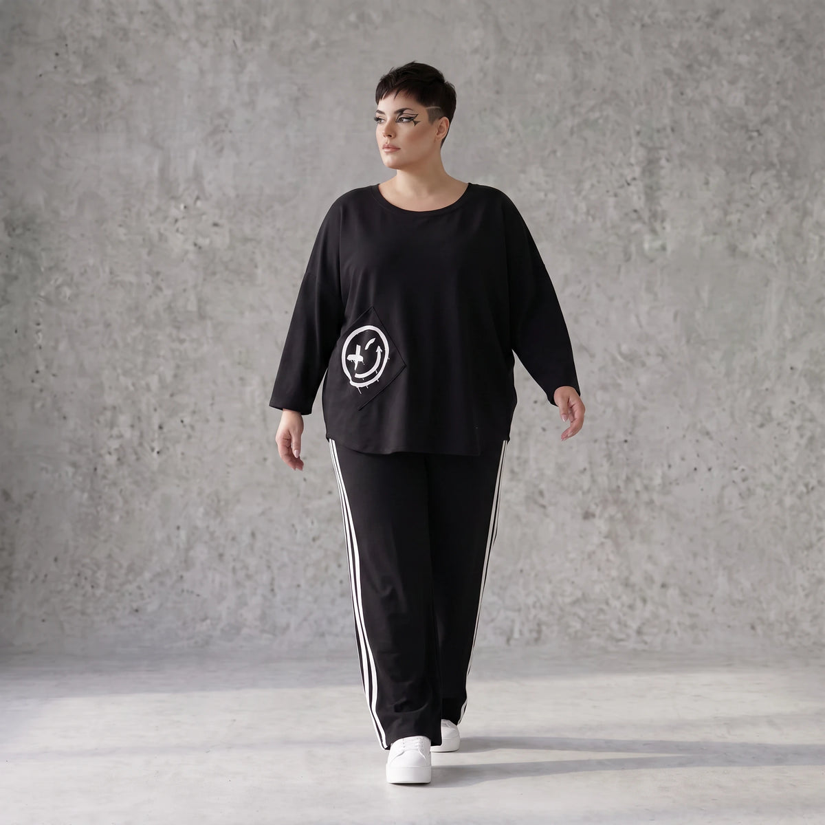 Ballonhose mit elastischem Bund und weissen Kontraststreifen im sportlichen College Look