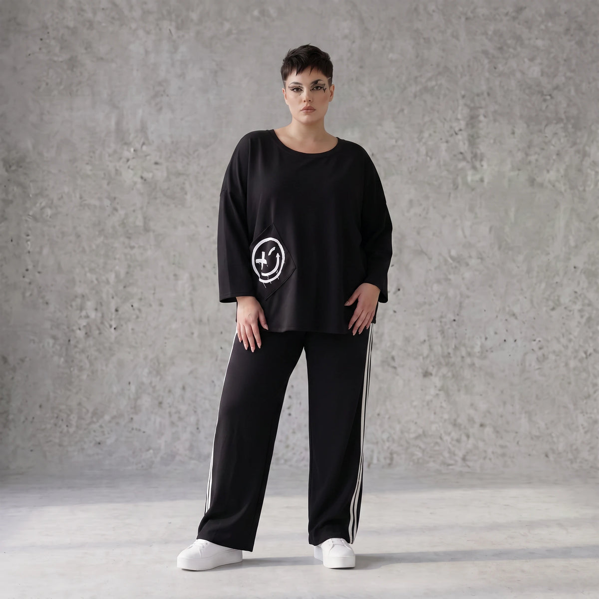 Ballonhose mit elastischem Bund und weissen Kontraststreifen im sportlichen College Look