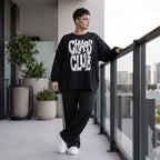 Statementshirt aus French Terry mit Chaos Club Print kastig und vorne kürzer geschnitten