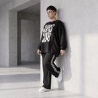 Statementshirt aus French Terry mit Chaos Club Print kastig und vorne kürzer geschnitten