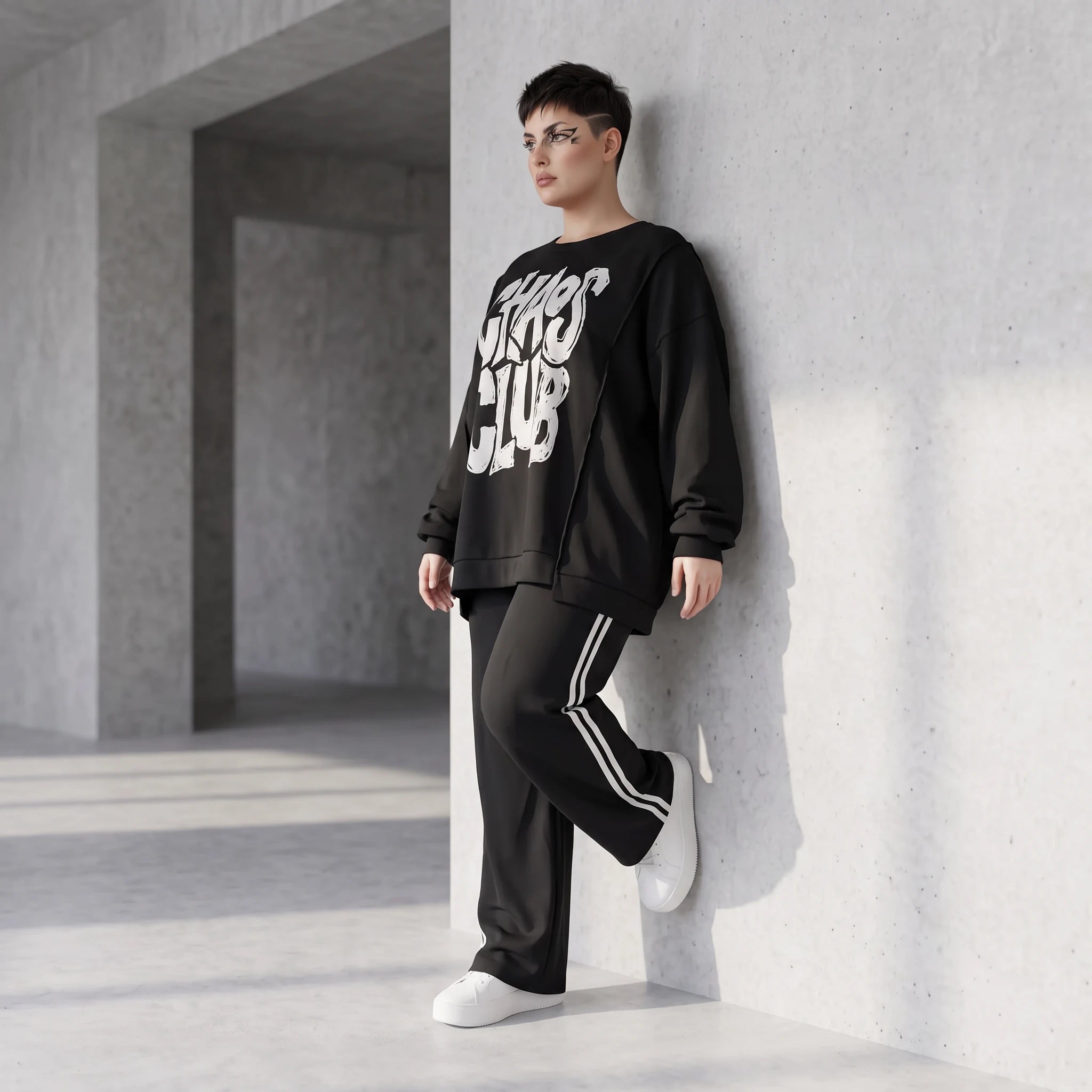 Statementshirt aus French Terry mit Chaos Club Print kastig und vorne kürzer geschnitten