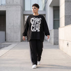 Statementshirt aus French Terry mit Chaos Club Print kastig und vorne kürzer geschnitten