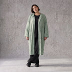 Cardigan in Pistaziengrün mit Kapuze aus weichem Jersey gerade geschnitten offen tragbar