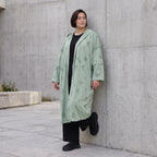 Cardigan in Pistaziengrün mit Kapuze aus weichem Jersey gerade geschnitten offen tragbar