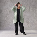 Pistaziengrüner Jerseycardigan in A-Linie mit Sternenmotiv aus Baumwolle und Elasthan