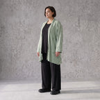Pistaziengrüner Jerseycardigan in A-Linie mit Sternenmotiv aus Baumwolle und Elasthan
